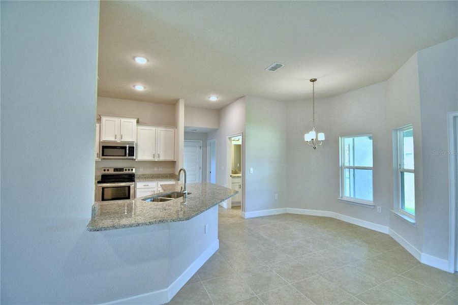 Furnished interior view inside a new home in Cadence Crossing, Auburndale (Image 9).