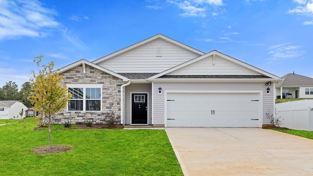 Front exterior of a new home in Spring Ridge, Anderson, SC, highlighting curb appeal (Image 1). Front exterior of a new home in Spring Ridge, Anderson, SC, highlighting curb appeal (Image 1).