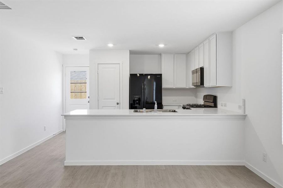Furnished interior view inside a new home in Falcon Heights, Forney (Image 11).