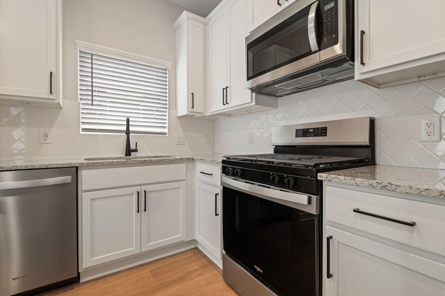 Furnished interior view inside a new home in Magnolia Woods, Magnolia (Image 5). Furnished interior view inside a new home in Magnolia Woods, Magnolia (Image 5).