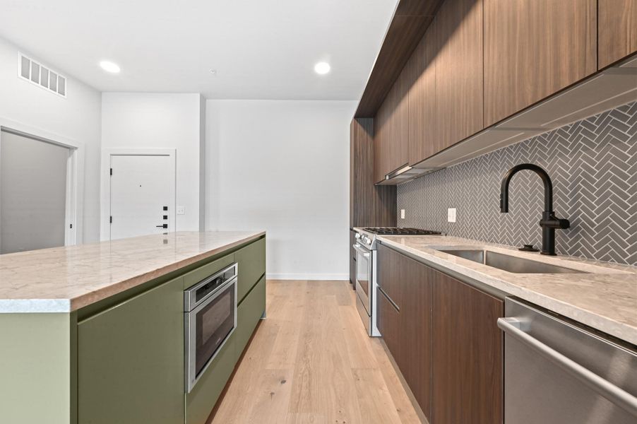 Furnished interior view inside a new home in One Oak, Austin (Image 16).