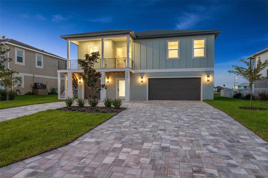 Front exterior of a new home in , Hernando Beach, FL, highlighting curb appeal (Image 25). Front exterior of a new home in , Hernando Beach, FL, highlighting curb appeal (Image 25).