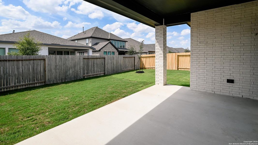 Exterior details and patio area of a home in Meadows Of Mill Creek 50', Seguin (Image 3).