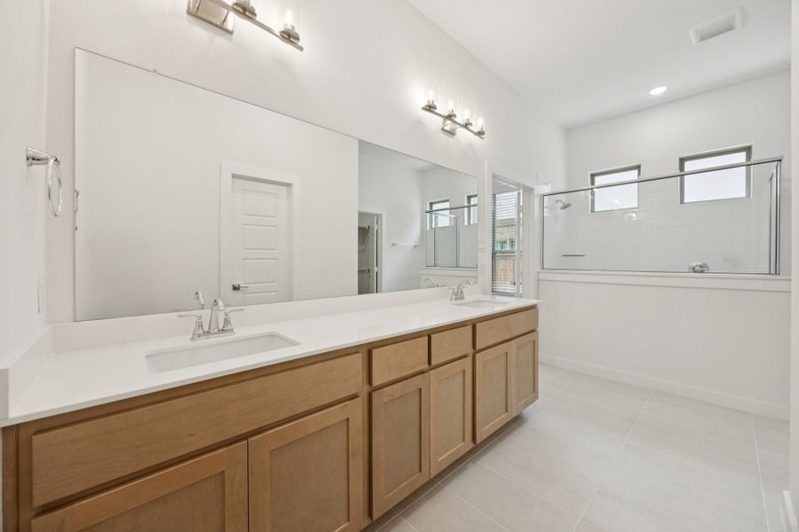 Primary Bathroom in the Monet II home plan by Trophy Signature Homes – REPRESENTATIVE PHOTO Primary Bathroom in the Monet II home plan by Trophy Signature Homes – REPRESENTATIVE PHOTO