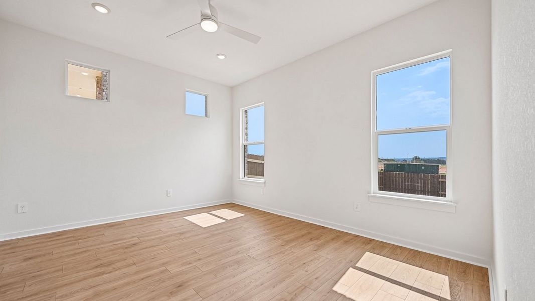 Spacious, unfurnished interior of a new home in The Enclave at Bar W Ranch, Leander (Image 39).