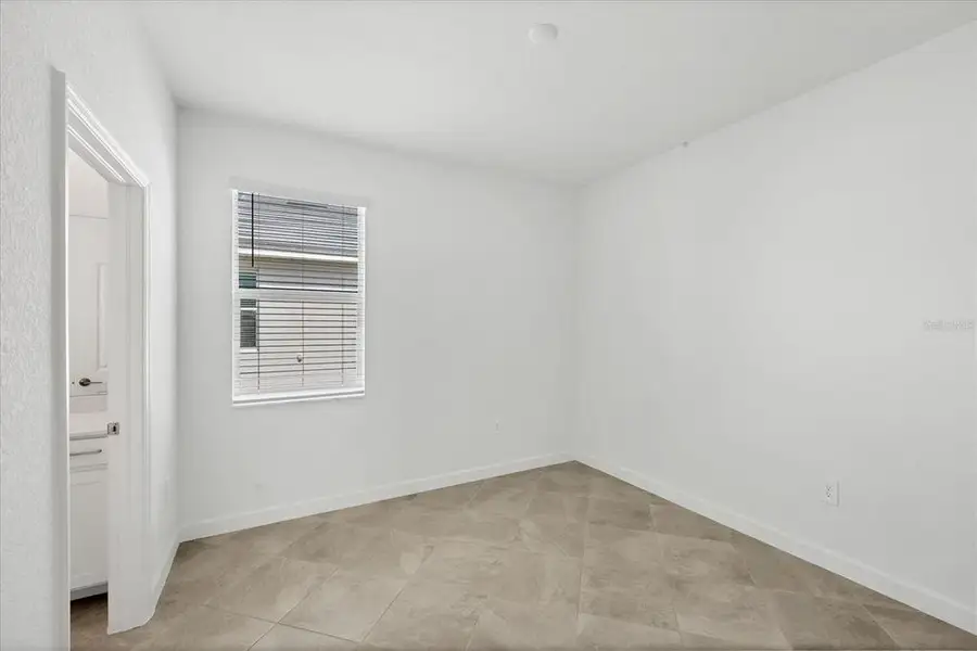 Spacious, unfurnished interior of a new home in , Port Charlotte (Image 16).