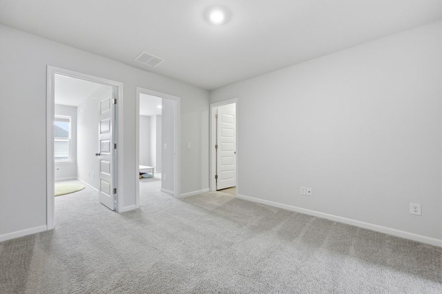 Spacious, unfurnished interior of a new home in Sweetgrass at Summers Corner: Carolina Collection, Summerville (Image 27).