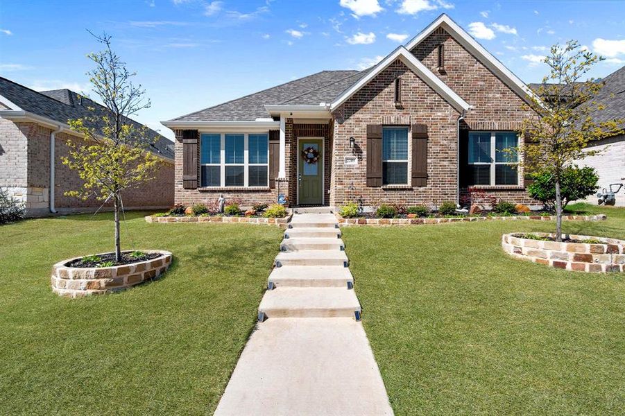 Front exterior of a new home in Dove Hollow, Waxahachie, TX, highlighting curb appeal (Image 21).