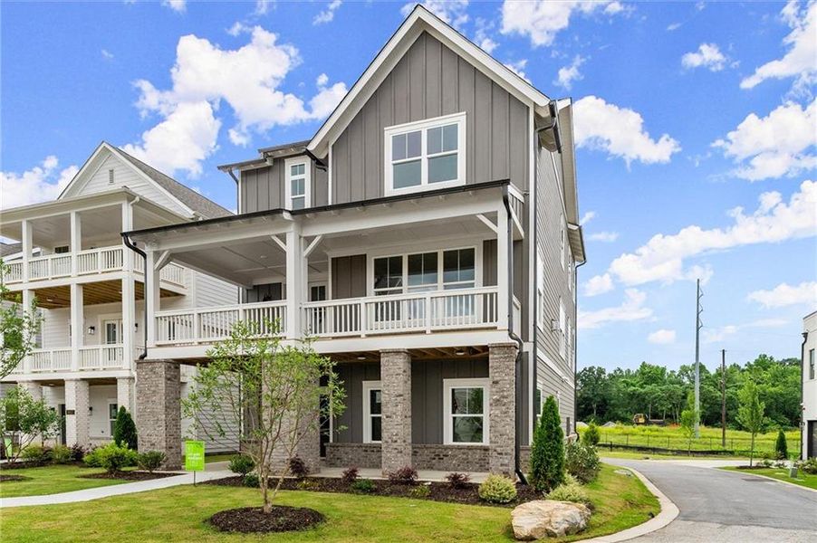 Front exterior of a new home in West Town, Atlanta, GA, highlighting curb appeal (Image 24). Front exterior of a new home in West Town, Atlanta, GA, highlighting curb appeal (Image 24).
