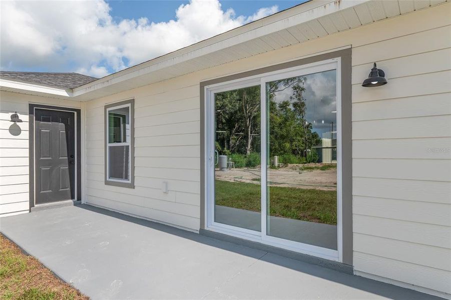 Front exterior of a new home in , Dunnellon, FL, highlighting curb appeal (Image 28).