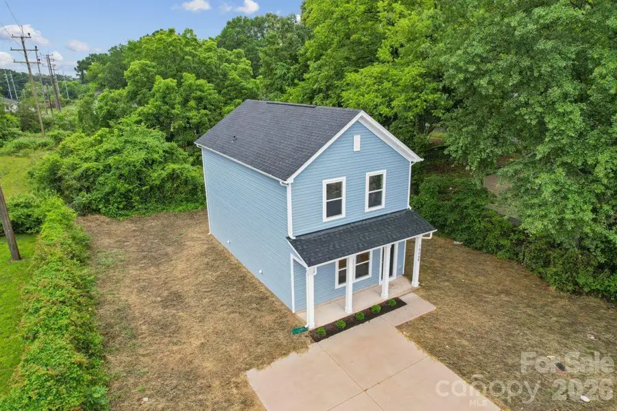 Front exterior of a new home in , Gastonia, NC, highlighting curb appeal (Image 13).
