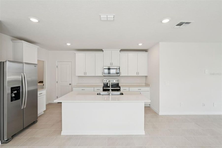 Furnished interior view inside a new home in Crosswinds - Classic Series, Haines City (Image 12).