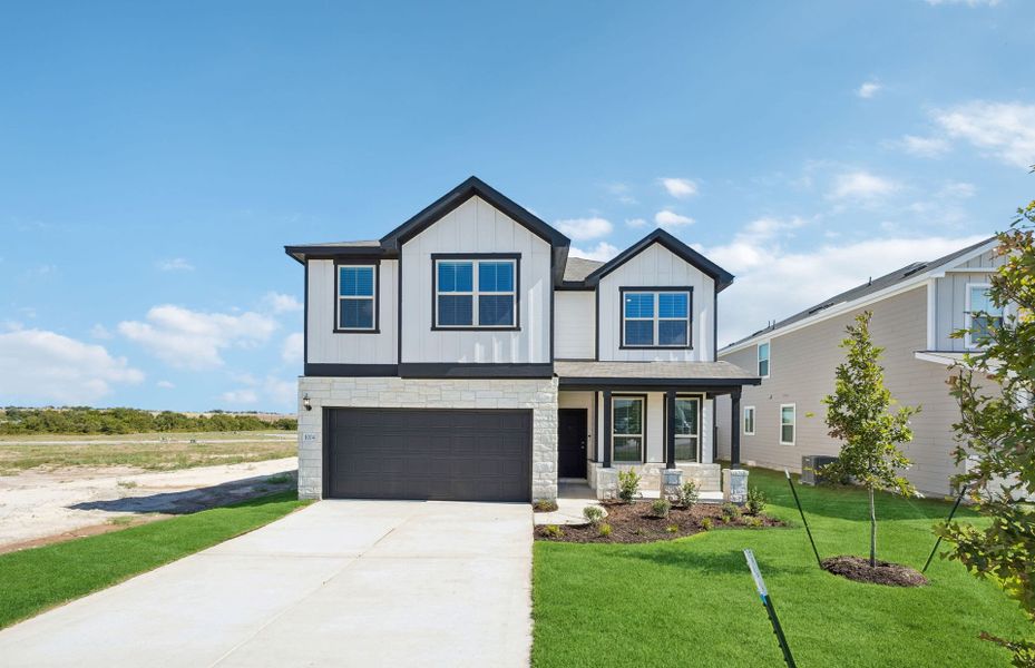 Front exterior of a new home in Sonterra, Jarrell, TX, highlighting curb appeal (Image 19). Front exterior of a new home in Sonterra, Jarrell, TX, highlighting curb appeal (Image 19).