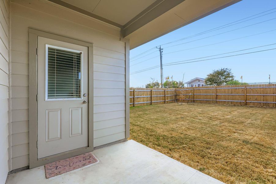 Exterior details and patio area of a home in Palomino, Manor (Image 2). Exterior details and patio area of a home in Palomino, Manor (Image 2).