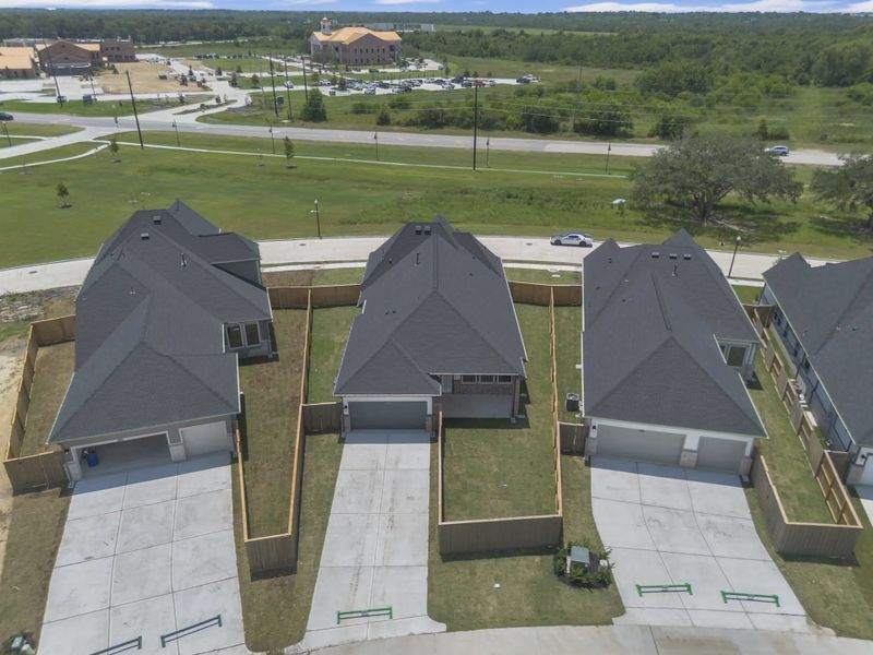 Image 107 representing the Mickelson by Chesmar Homes in Riceland Alley Loads, Mont Belvieu, TX.