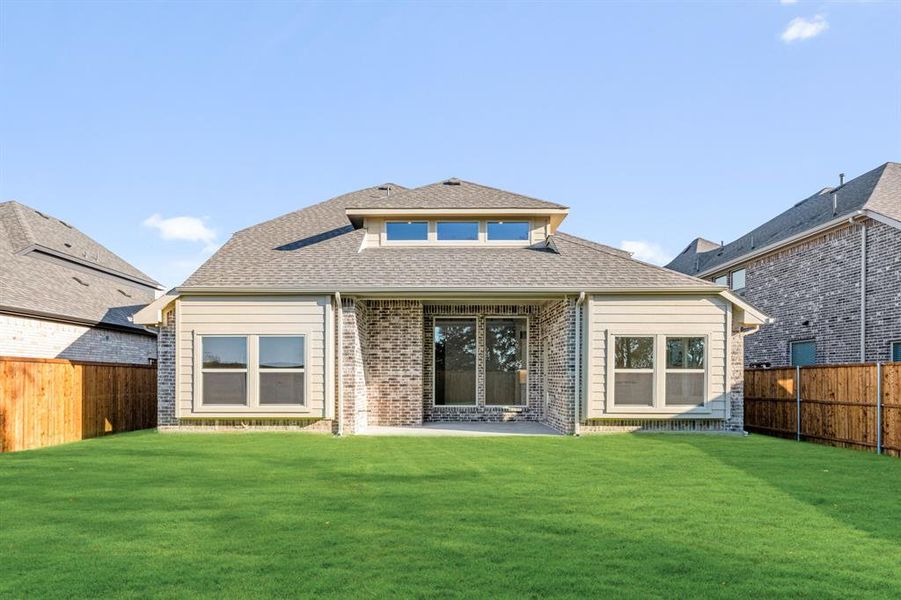 Exterior details and patio area of a home in Woodstone, Providence Village (Image 25). Exterior details and patio area of a home in Woodstone, Providence Village (Image 25).