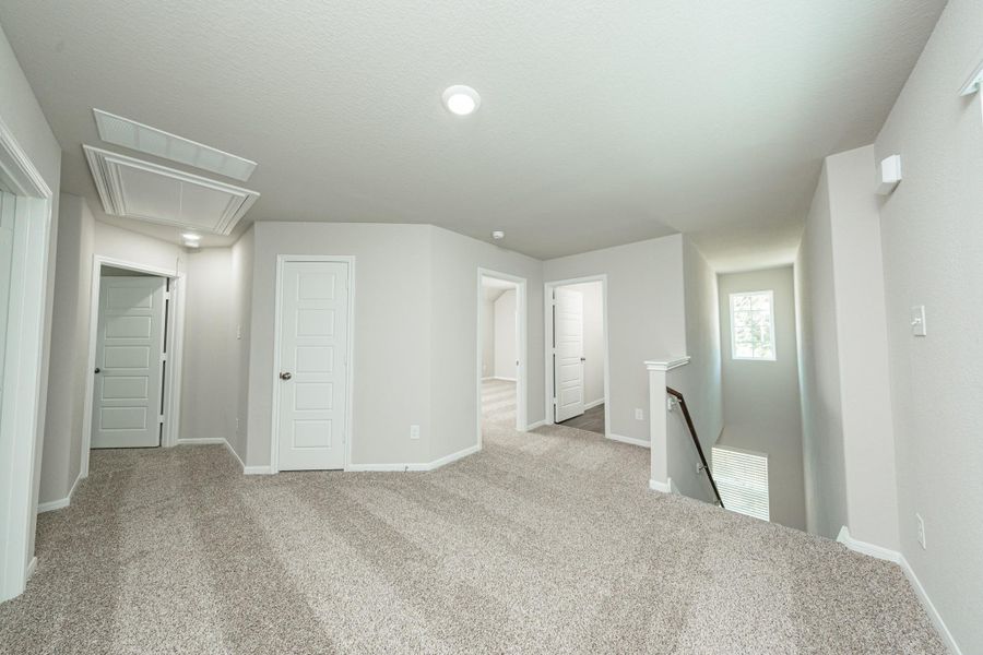 Spacious, unfurnished interior of a new home in Mackenzie Creek, Conroe (Image 13). Spacious, unfurnished interior of a new home in Mackenzie Creek, Conroe (Image 13).
