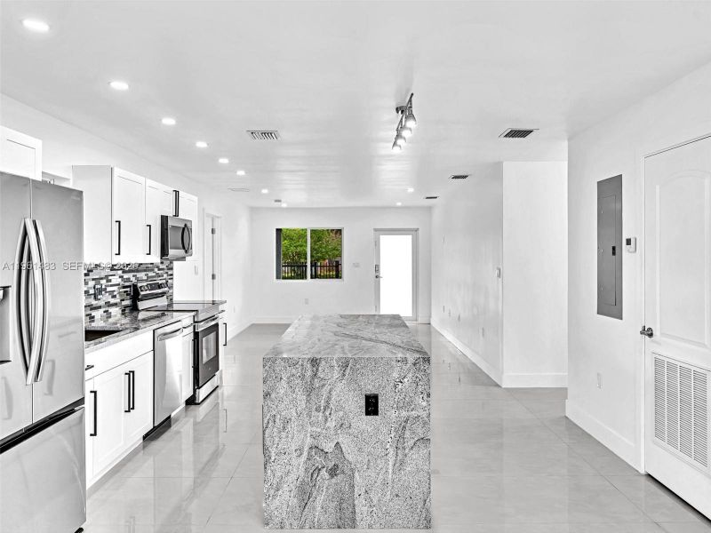 Furnished interior view inside a new home in , North Miami (Image 12).