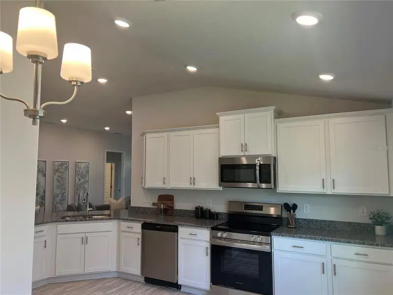 Furnished interior view inside a new home in Abbey Glen, Dade City (Image 7).