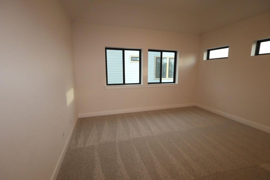 Spacious, unfurnished interior of a new home in Sienna - Landmark Row Collection, Missouri City (Image 8). Spacious, unfurnished interior of a new home in Sienna - Landmark Row Collection, Missouri City (Image 8).