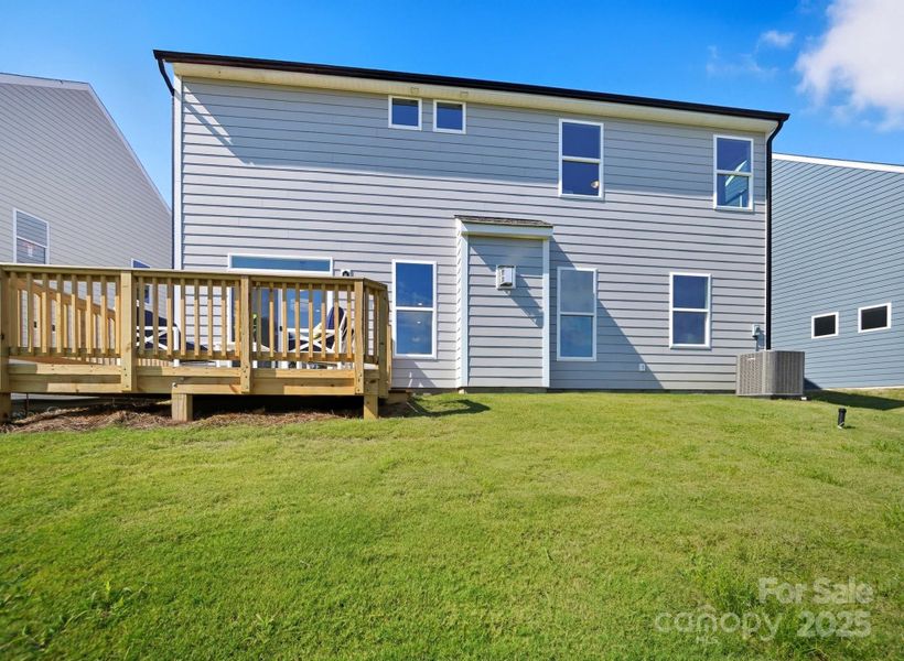 Front exterior of a new home in Summerlin, Mooresville, NC, highlighting curb appeal (Image 24). Front exterior of a new home in Summerlin, Mooresville, NC, highlighting curb appeal (Image 24).