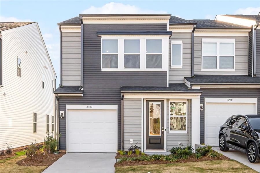 Front exterior of a new home in Fifteen 15 Cannon, Charlotte, NC, highlighting curb appeal (Image 19).