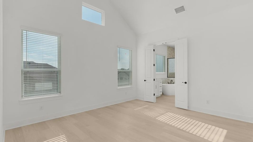 Representative unfurnished interior of a home built from the Cornell by Chesmar Homes in Crescent Bluff, Georgetown (Image 16).