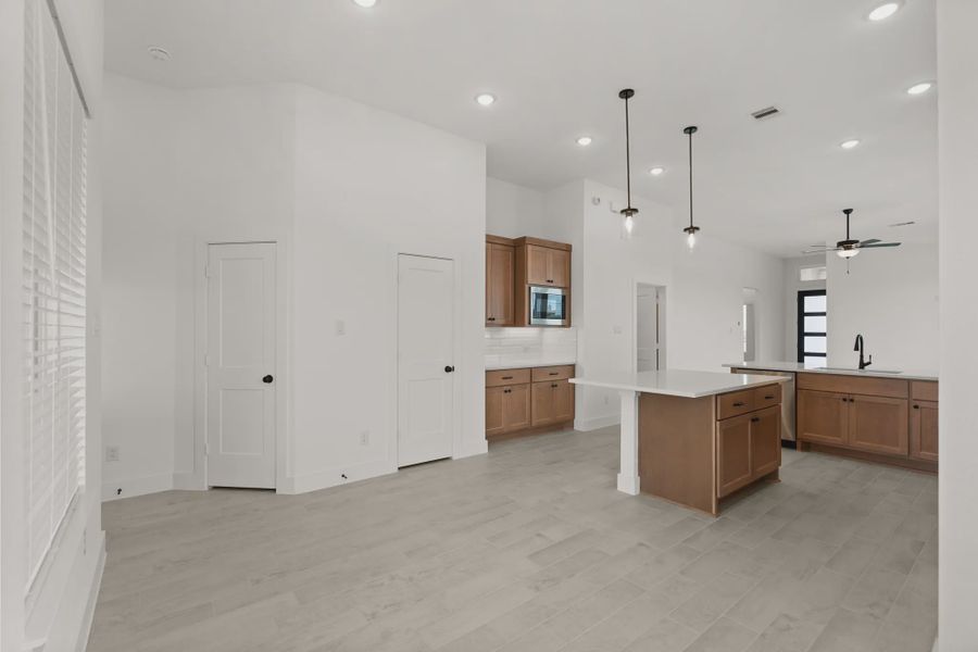 Representative furnished interior of a home built from the Pinehurst by Chesmar Homes in Riceland Alley Loads, Mont Belvieu (Image 8).