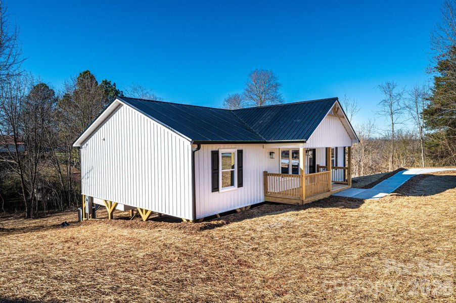 Exterior details and patio area of a home in , Connelly Springs (Image 3).