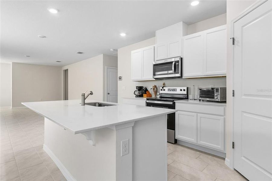 Furnished interior view inside a new home in Lake Deer Estates, Poinciana (Image 3).