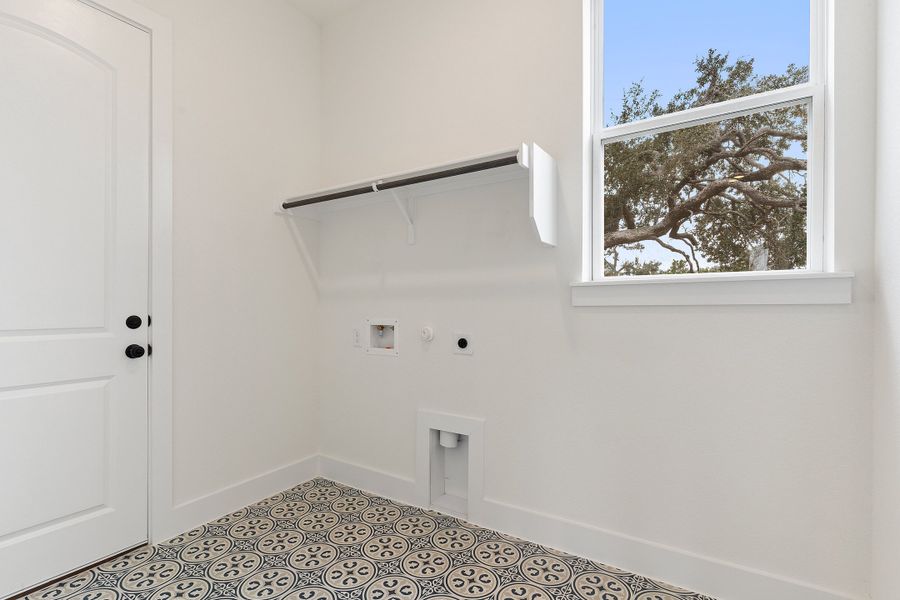 Representative unfurnished interior of a home built from the Waterville by Ashton Woods in The Trails at Carmel, Pflugerville (Image 56).