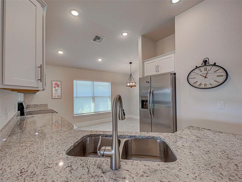 Furnished interior view inside a new home in Watercress Cove, North Port (Image 12).