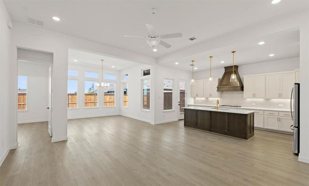 Open Kitchen-Living-Dining Room Representative Photo featuring the Serene Collection