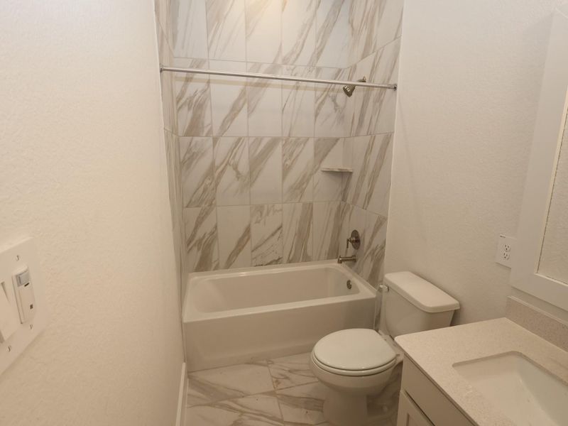 Furnished interior view inside a new home in Lone Star Landing, Montgomery (Image 4).