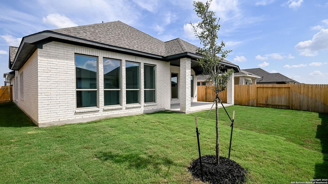 Exterior details and patio area of a home in Meadows Of Mill Creek 50', Seguin (Image 19).