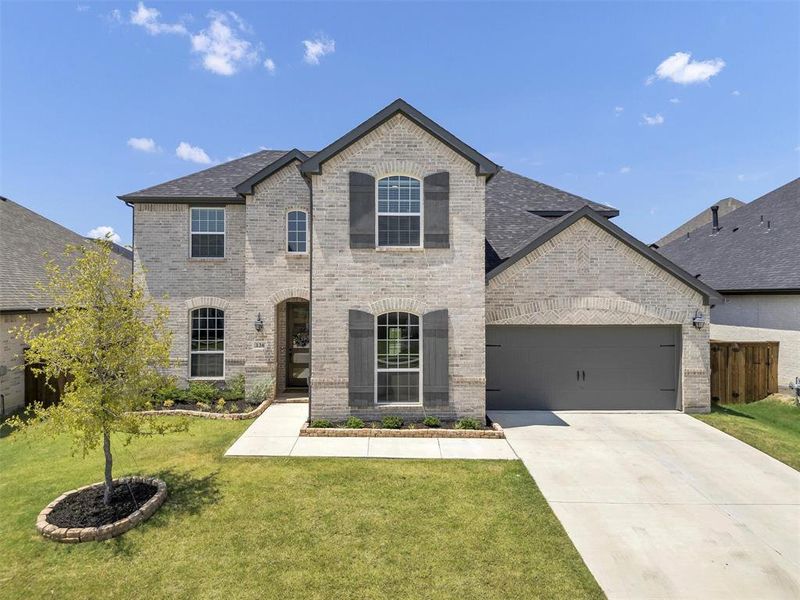 Front exterior of a new home in , Newark, TX, highlighting curb appeal (Image 2).