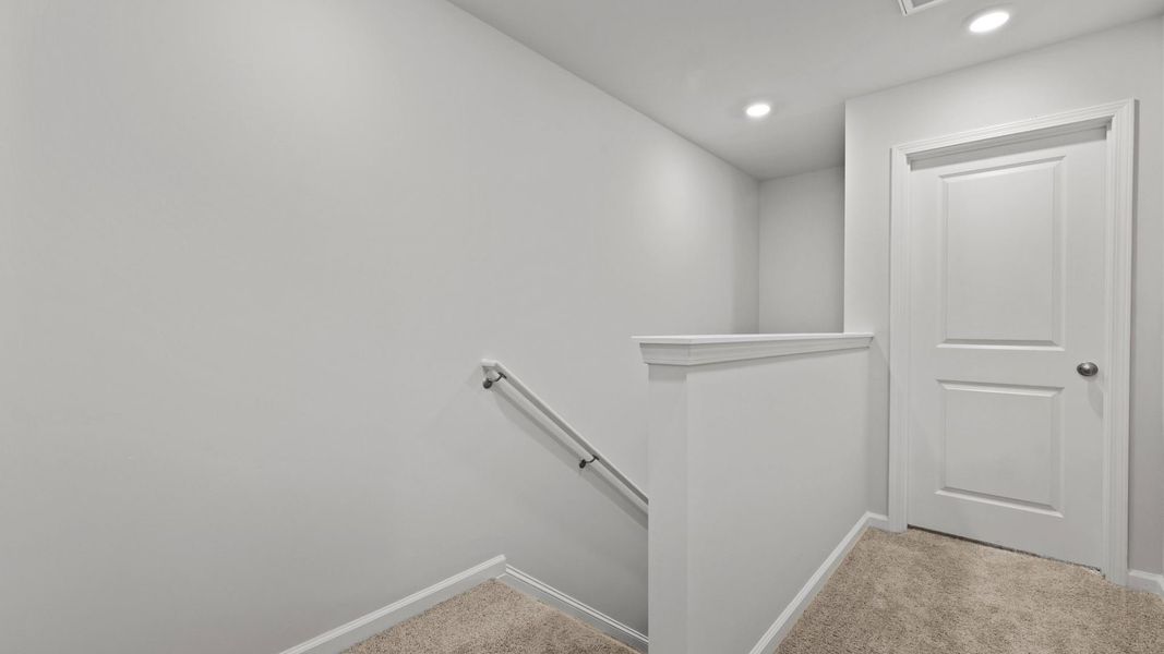 Representative unfurnished interior of a home built from the DENMARK by D.R. Horton in Pine Hills Townhomes at Cane Bay, Summerville (Image 25).