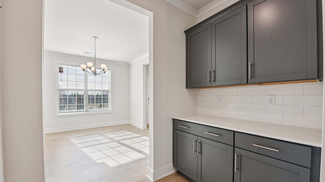 Representative furnished interior of a home built from the Adams by D.R. Horton in Oak Grove Hill, Huntersville (Image 3).