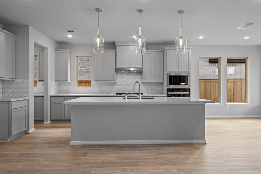 Furnished interior view inside a new home in Bridgeland 55', Cypress (Image 11).