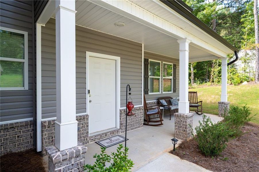Front exterior of a new home in , Dallas, GA, highlighting curb appeal (Image 20).