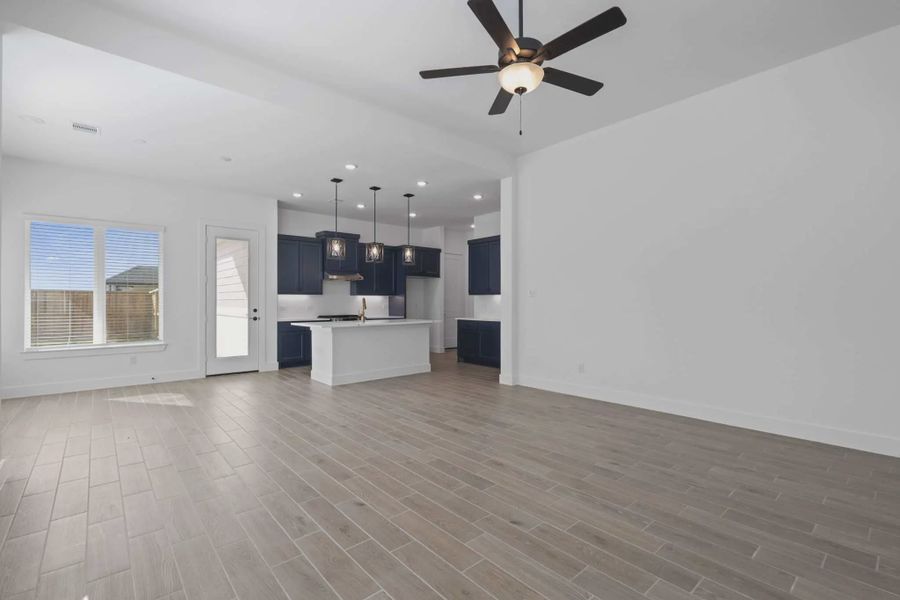 Image 24 representing the Oakmont by Chesmar Homes in Riceland Alley Loads, Mont Belvieu, TX.
