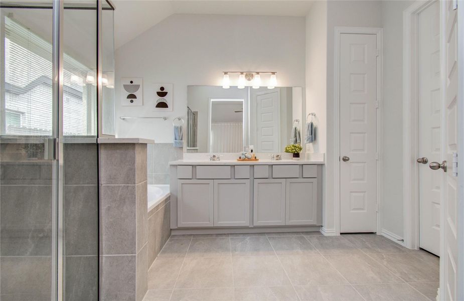 Furnished interior view inside a new home in Sunterra, Katy (Image 5).