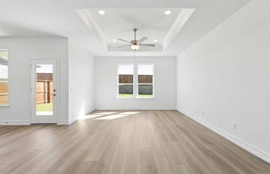 Spacious gathering room with access to backyard