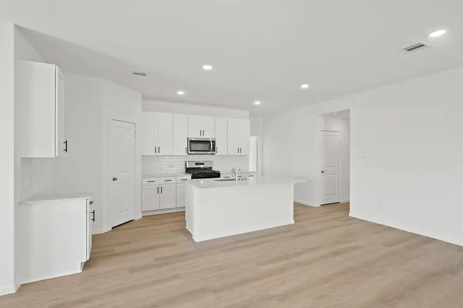 Furnished interior view inside a new home in Grand Pines, Magnolia (Image 3). Furnished interior view inside a new home in Grand Pines, Magnolia (Image 3).