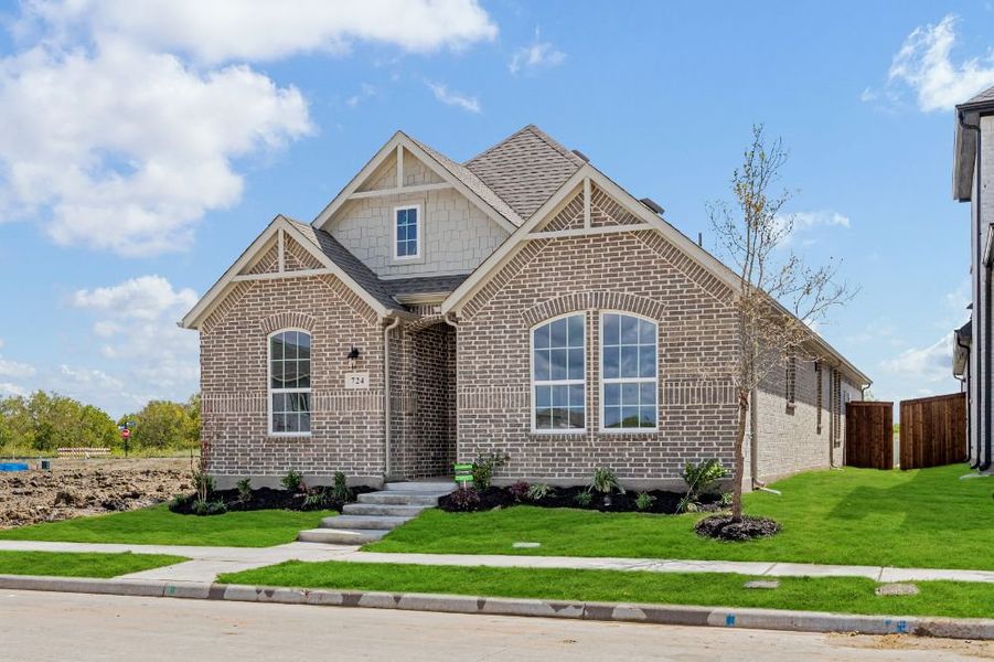 Representative exterior photo of a completed home built from the Cedar by UnionMain Homes in Edgewater, Fate, TX (Image 24). Representative exterior photo of a completed home built from the Cedar by UnionMain Homes in Edgewater, Fate, TX (Image 24).
