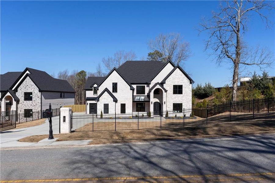 Front exterior of a new home in , Suwanee, GA, highlighting curb appeal (Image 34).