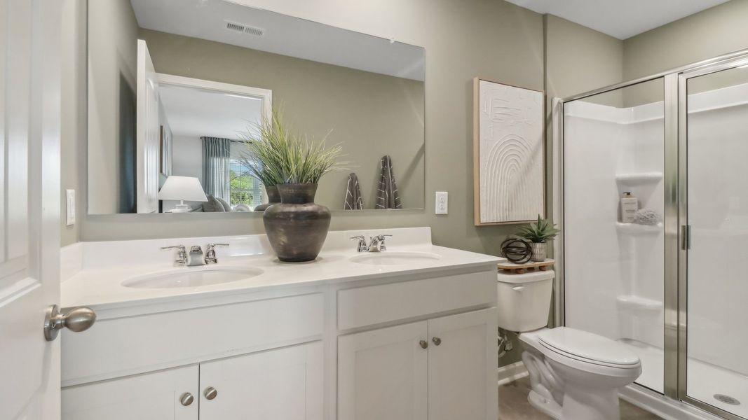 Furnished interior view inside a new home in Wellington Park, Lithonia (Image 27).