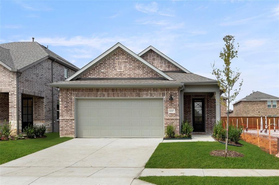 Front exterior of a new home in Creekview Fossil Ridge, Pilot Point, TX, highlighting curb appeal (Image 18). Front exterior of a new home in Creekview Fossil Ridge, Pilot Point, TX, highlighting curb appeal (Image 18).