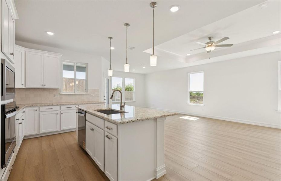 Open kitchen layout perfect for entertaining and creating a connected home environment  *Real home pictured