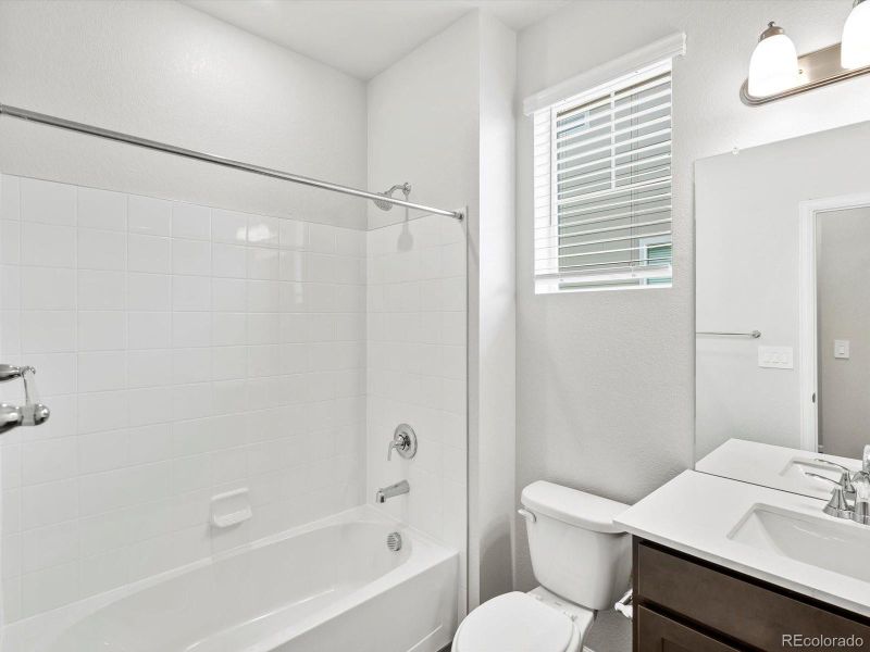 Furnished interior view inside a new home in Buffalo Highlands: The Flora Collection, Commerce City (Image 6).